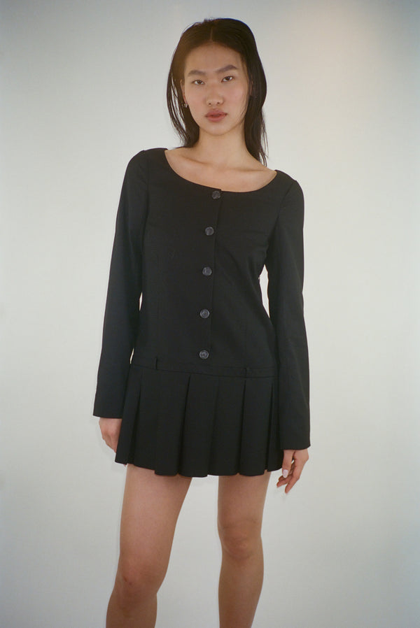 Long sleeve mini dress in black suting with buttons and pleats