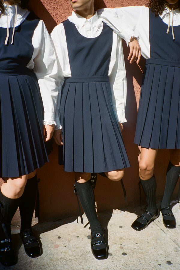 Wool pleated mini dress in navy