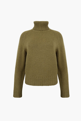 Green sweater with a high collar on a white background