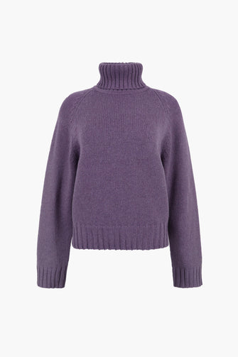 Purple sweater on a white background