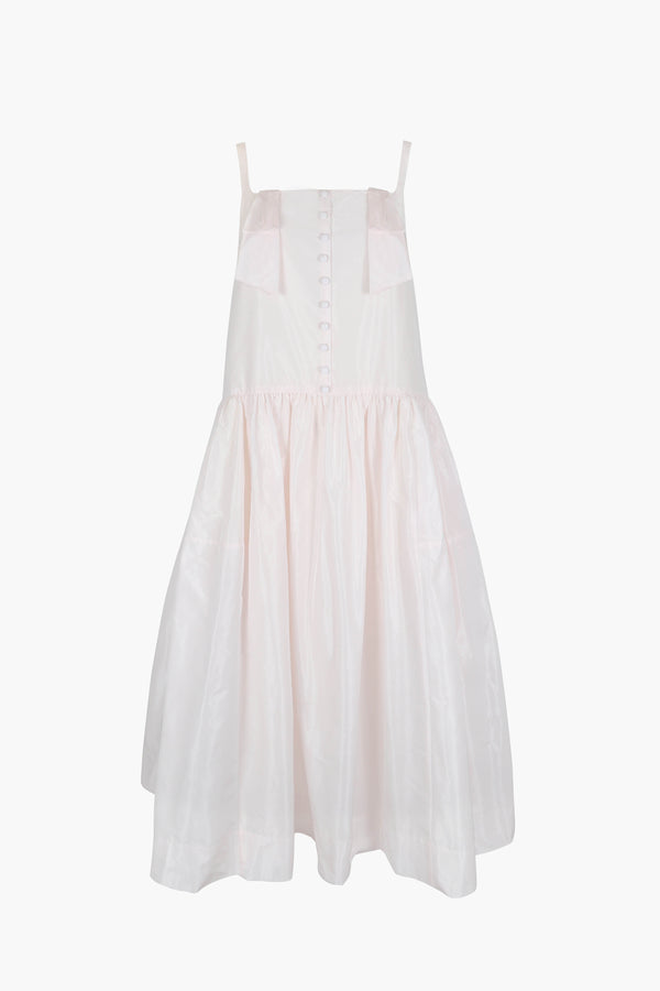 Midi length dress in blush pink taffeta with buttons and cape detail at back