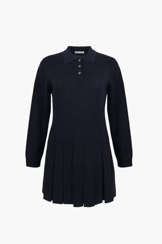 A navy mini sweater dress with long sleeves and a polo neck. It features mother of pearl buttons against a white background
