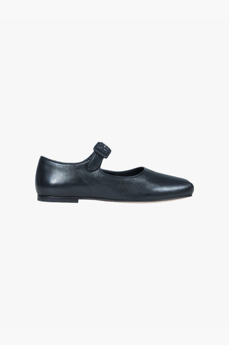Black Nappa leather Mary Jane ballet flat with an adjustable pin-buckle strap and a stacked leather heel against a white background