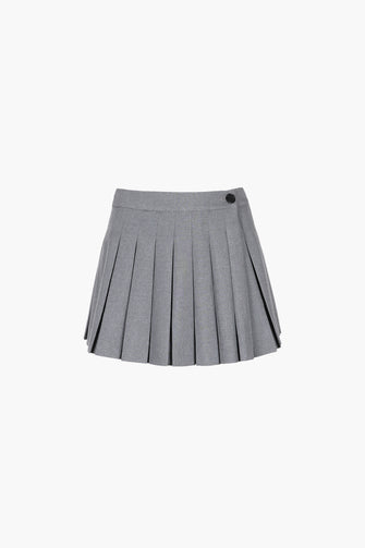 A pleated mini skort in grey with built-in shorts, displayed on a plain background.