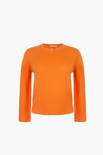 Orange sweater on a white background