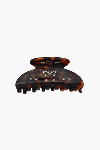 Tortoiseshell hair clip with rhinestones on a white background