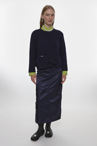 navy blue mid length nylon skirt on model
