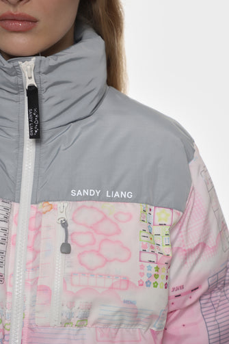 Close-up of a jacket with 'Sandy Liang' branding on a white background