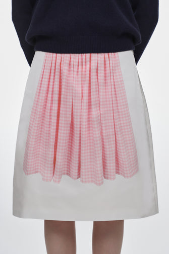 Skirt with a pink checkered pattern on a white background