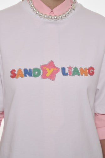 White shirt with colorful text and star design on a white background