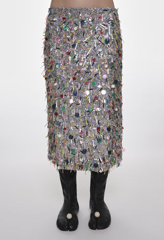 Skirt made of colorful sequins on a white background