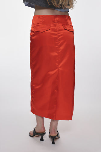 orange mid length nylon skirt on model