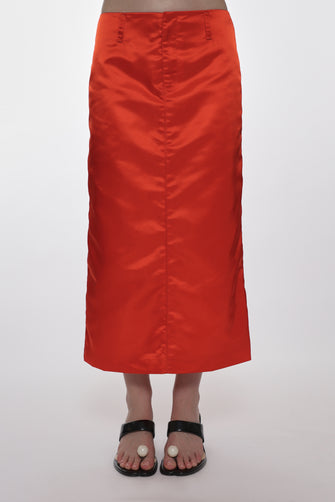 orange mid length nylon skirt on model