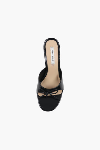 A top view of a black spazzolato leather thong mule with a padded leather footbed and a 90mm heel against a white background