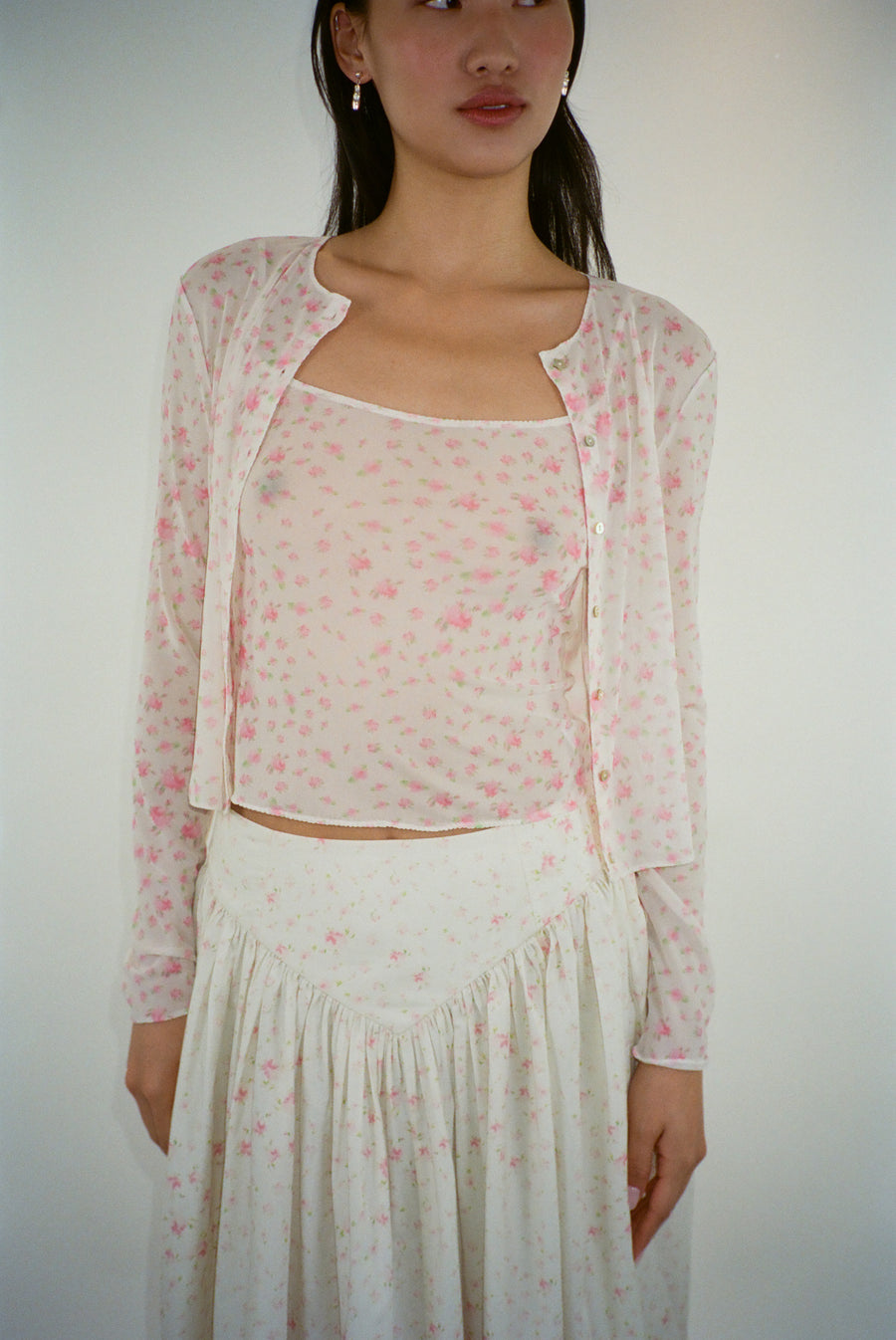 Mesh cardigan in pink floral print on model