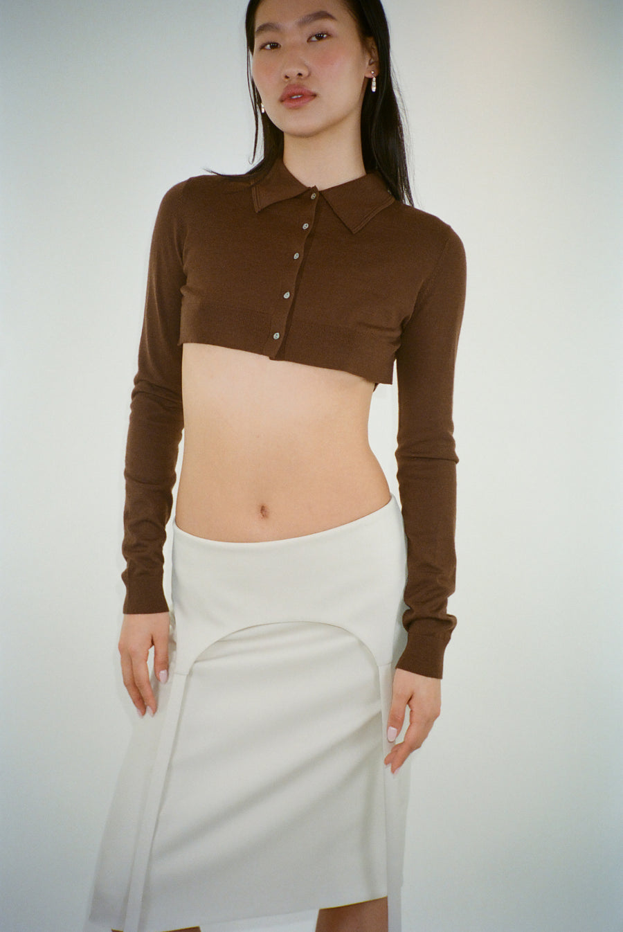 Cropped long sleeve cardigan in espresso brown on model