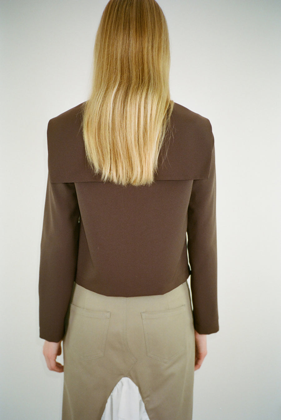Long sleeve top in brown with sailor color and rose detail at front on model