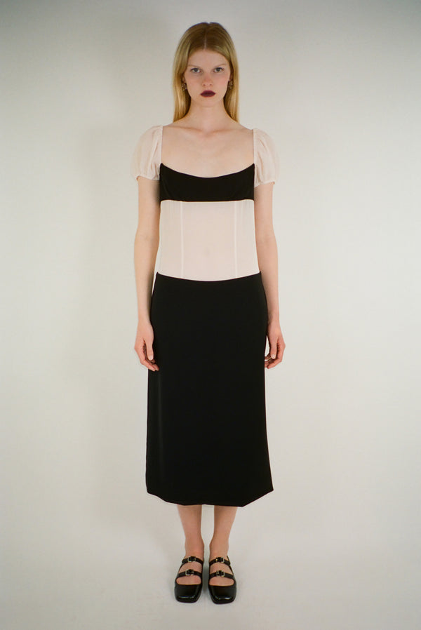 Midi length dress in off white and black with sheer bodice