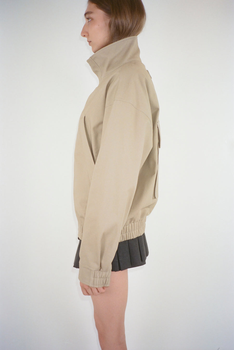 Oversized jacket in taupe with pockets at chest on model