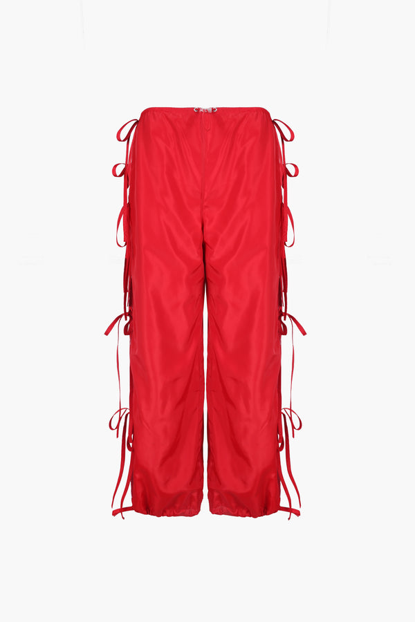 Trackpant in red with slits and ties at sides