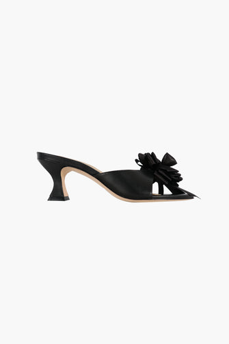 product image of a black heel shoe with bow on a white background