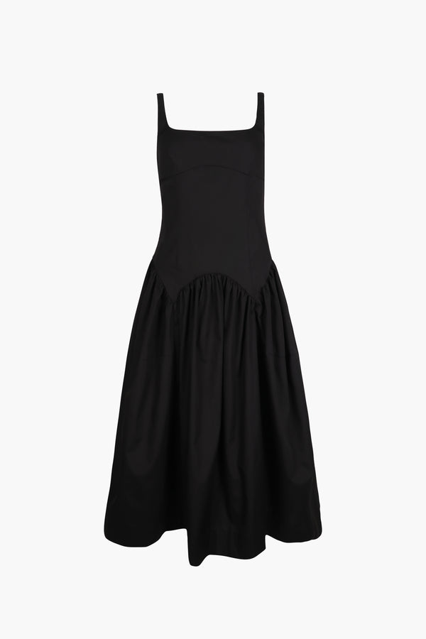 Sleeveless midi length dress in black with ties at back