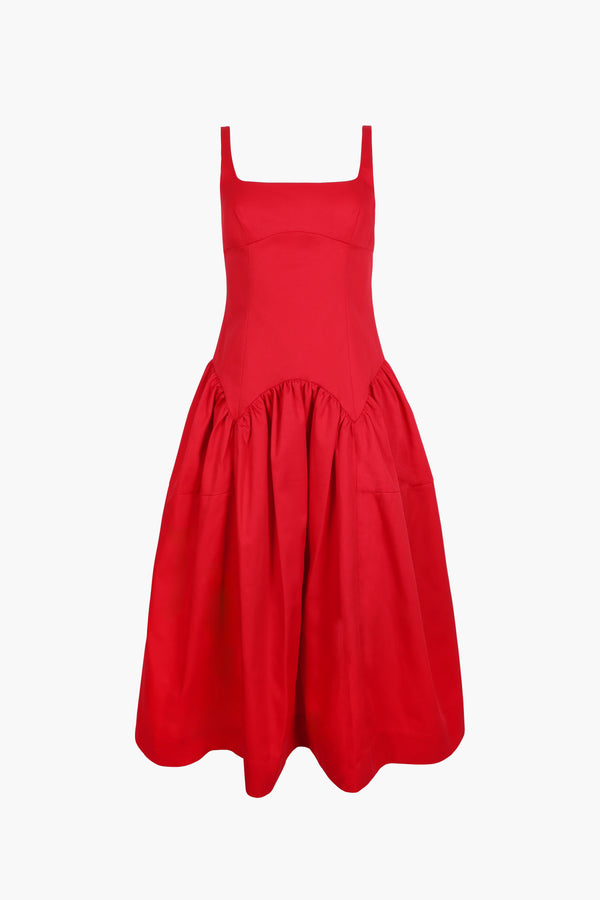 Sleeveless midi length dress in red with ties at back