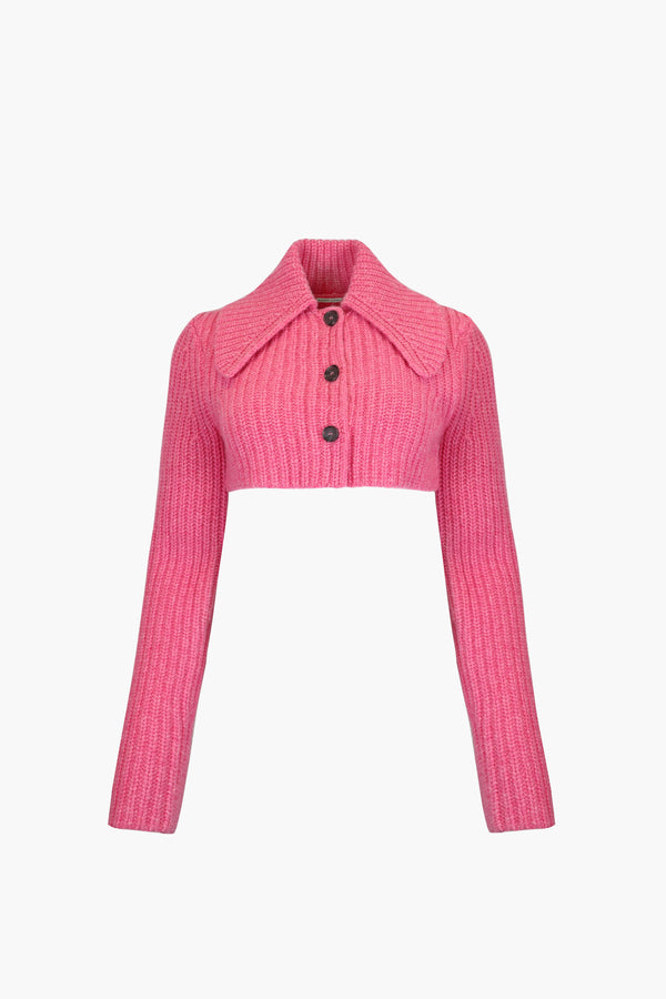 Cropped cardigan sweater in carnation pink with button closure