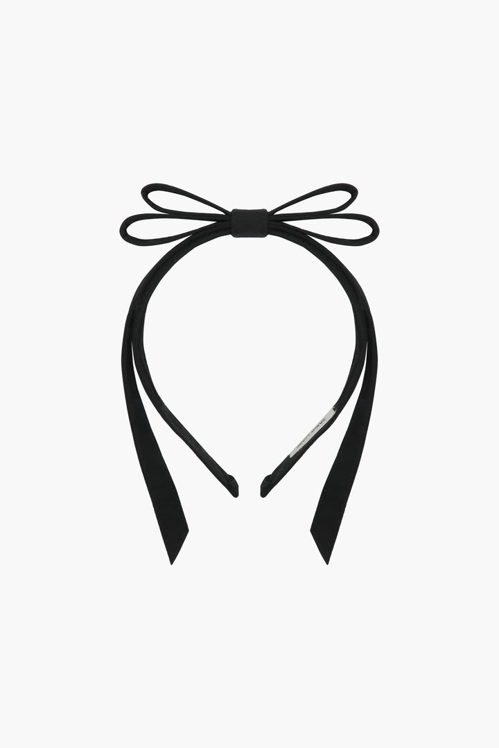 Black headband with bow on top