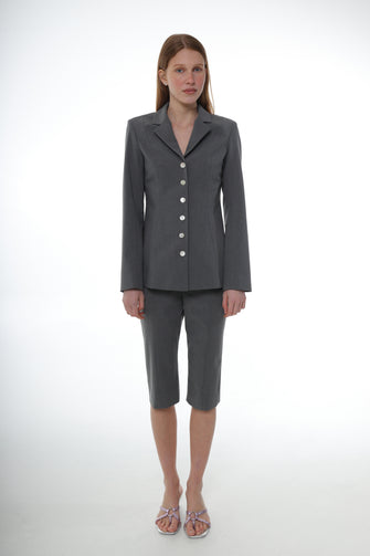 MELVIN CAPRIS IN GREY