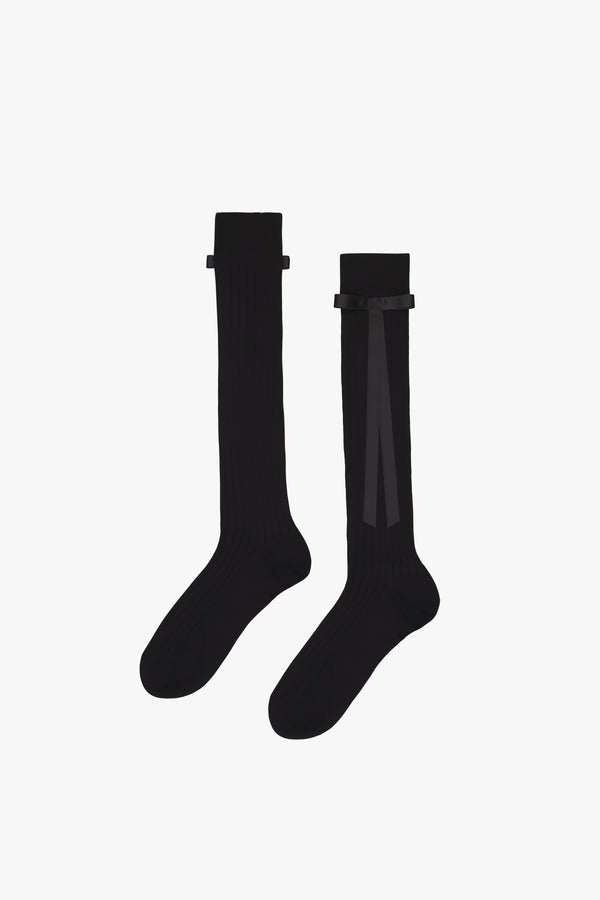 Cotton blend knee high socks in black with black long satin bows at side