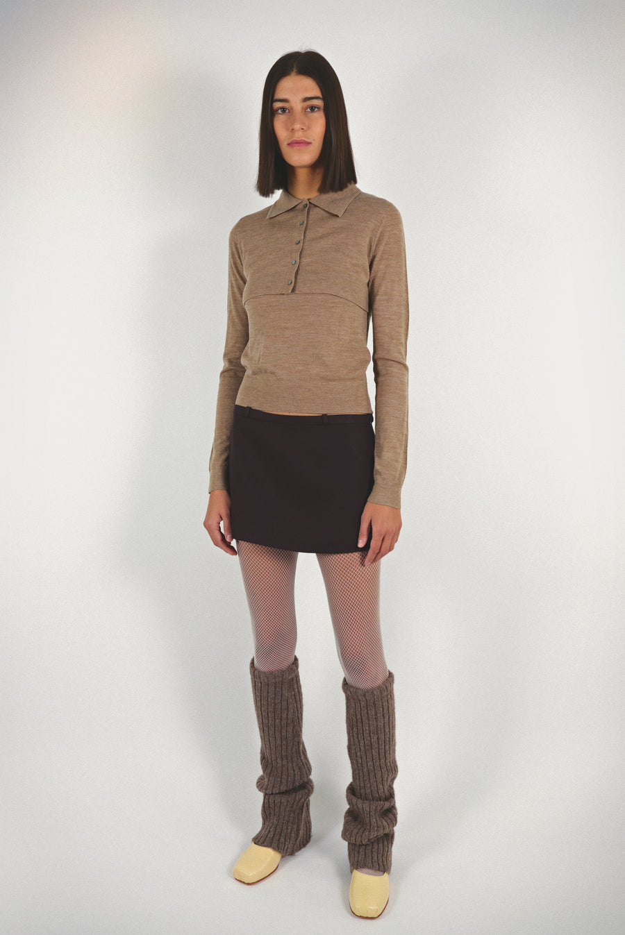 Long sleeve sweater in peanut with cropped cardigan layer on model