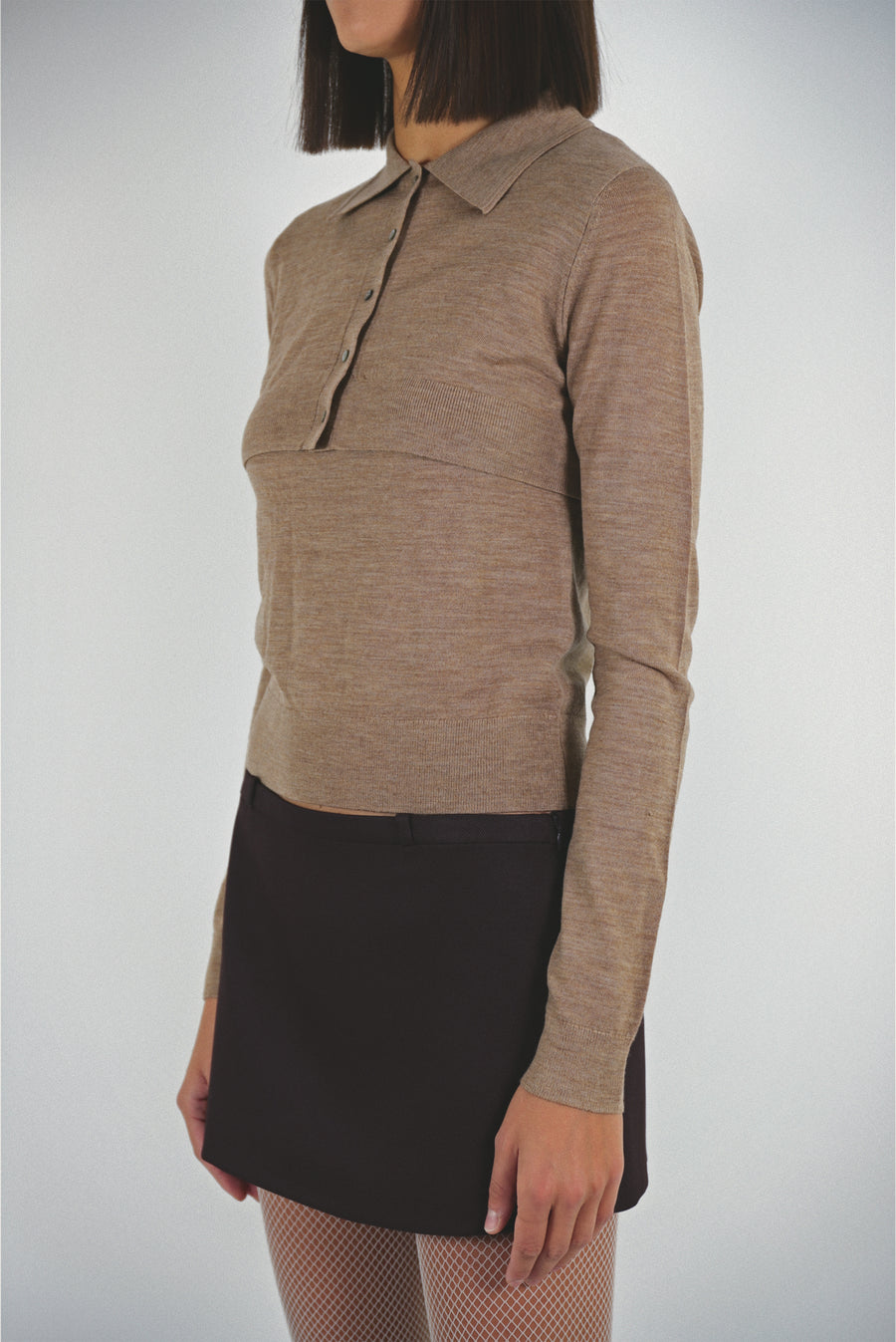 Long sleeve sweater in peanut with cropped cardigan layer on model