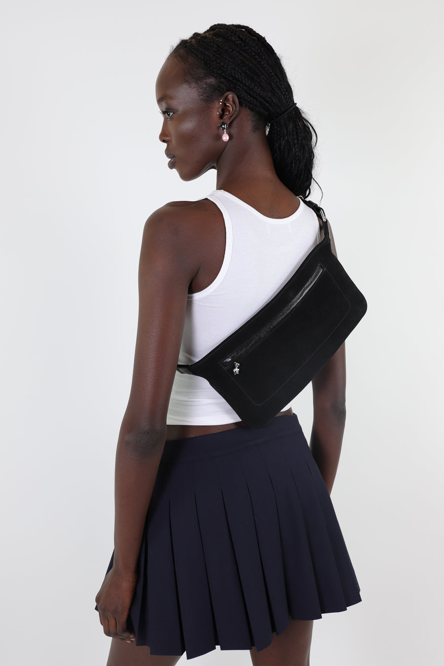 Black suede and leather crossbody or waist bag on model