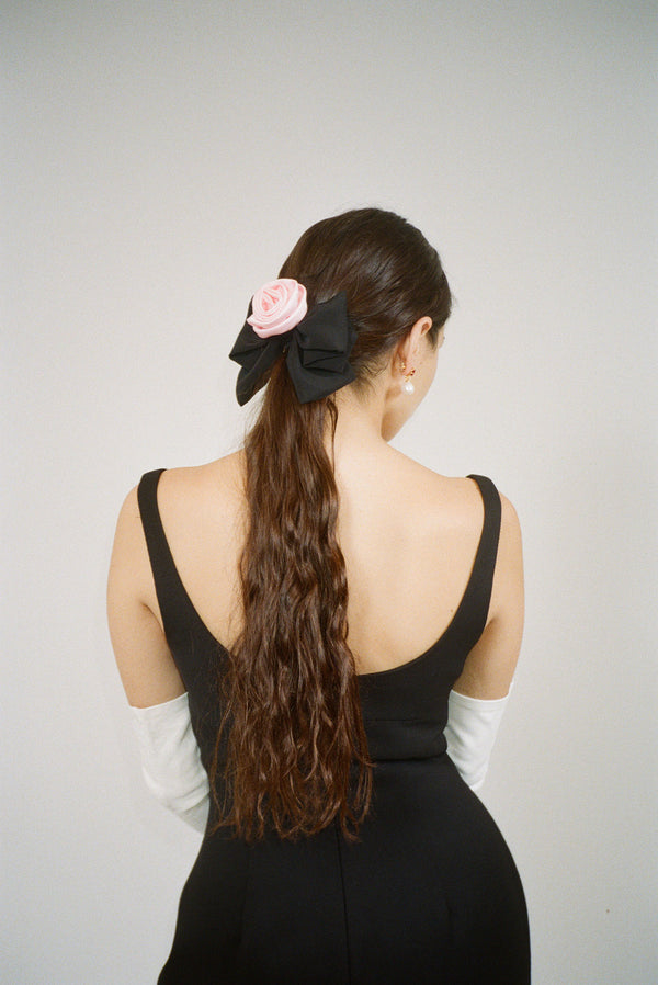 Black hair bow with pink satin rose