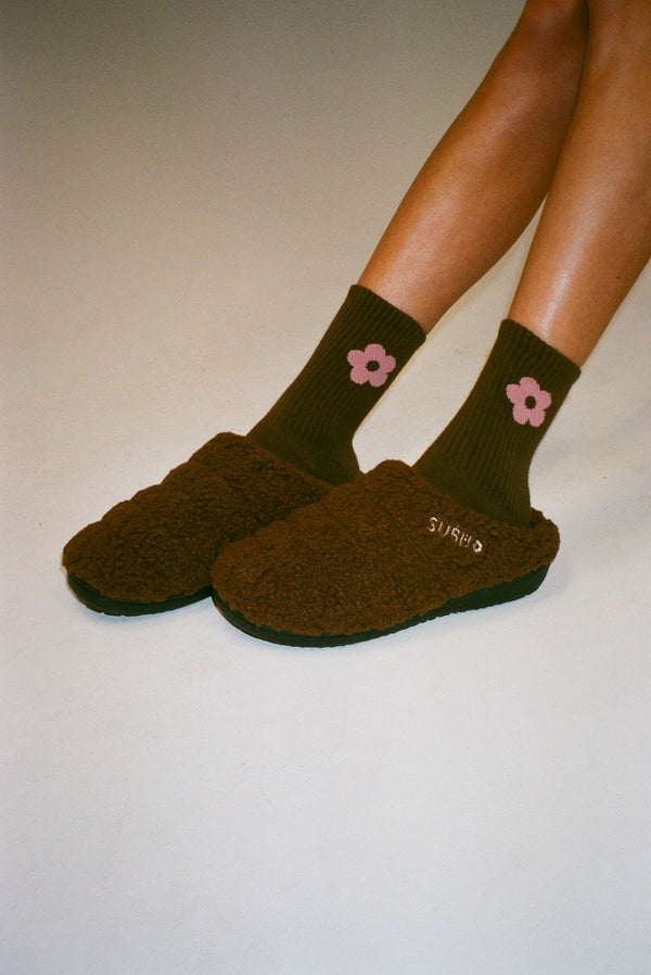 Brown crew length sock with pink flower on either side